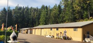 Image shows the whole of the building with the new roof installed